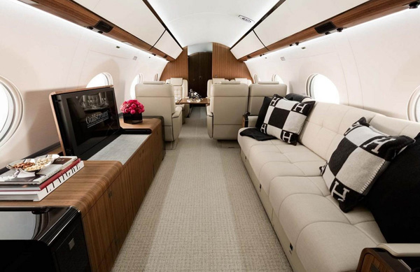 The Gulfstream G650ER has enough space for passengers to move around between dedicated areas of the cabin