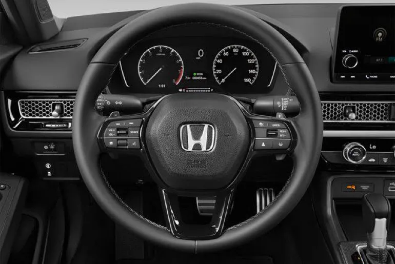 An image showing the car steering of a 2022 Honda Civic.