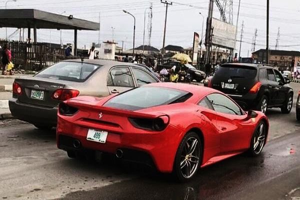 Ferrari 488 vs Toyota Corolla on a Nigerian road