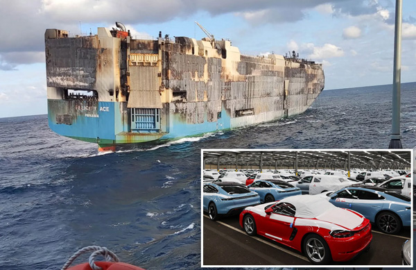 A burning cargo ship carrying Luxurious Porsches and Bentleys sinks in sea