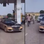 Lagos Big Boys Chase After Davido’s Maybach for Money as Singer Returns to Nigeria