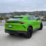 The Bright Green 2021 Lamborghini Urus SUV back view