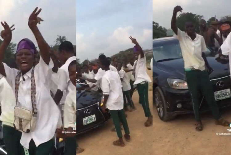 A picture of SS1 Student celebrating his Lexus ES350