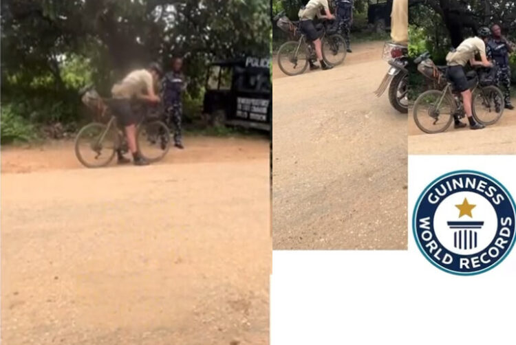 Nigerian Police Questions Man on a Bike Trip from Germany to Nigeria to Break Guinness World Record