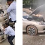 An image showing a man trying to quench the vapour of an overheating car.