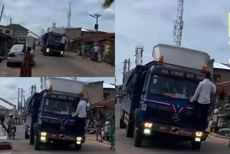 Truck Driver Was Seen Carrying A VIO Officer On His Front Bumper