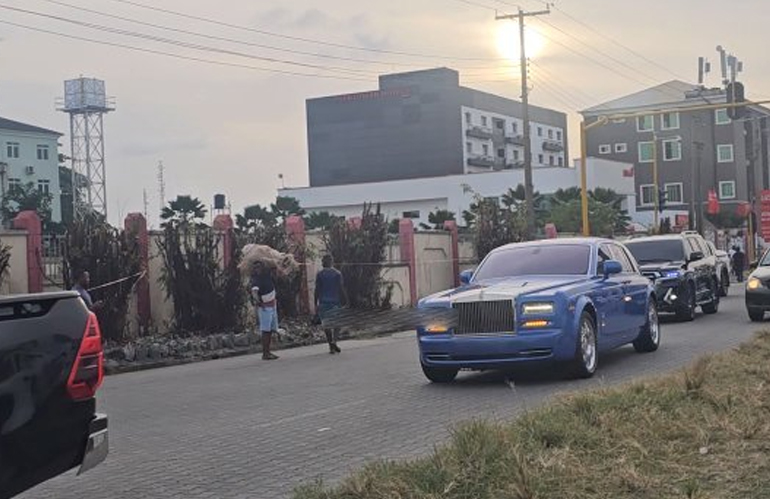 Video Shows Off Moment E-Money’s Luxury Car Convoy Was Caught Driving Through Streets of Lagos