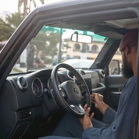 Tunde Onakoya checking his new car