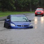 Electric Cars and Floods in Nigeria Road