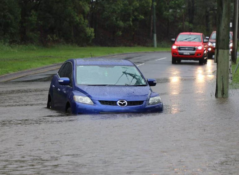 Electric Cars and Floods in Nigeria Road